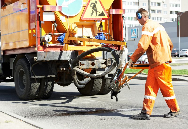 Improves safety by repairing cracks and potholes that could cause accidents
